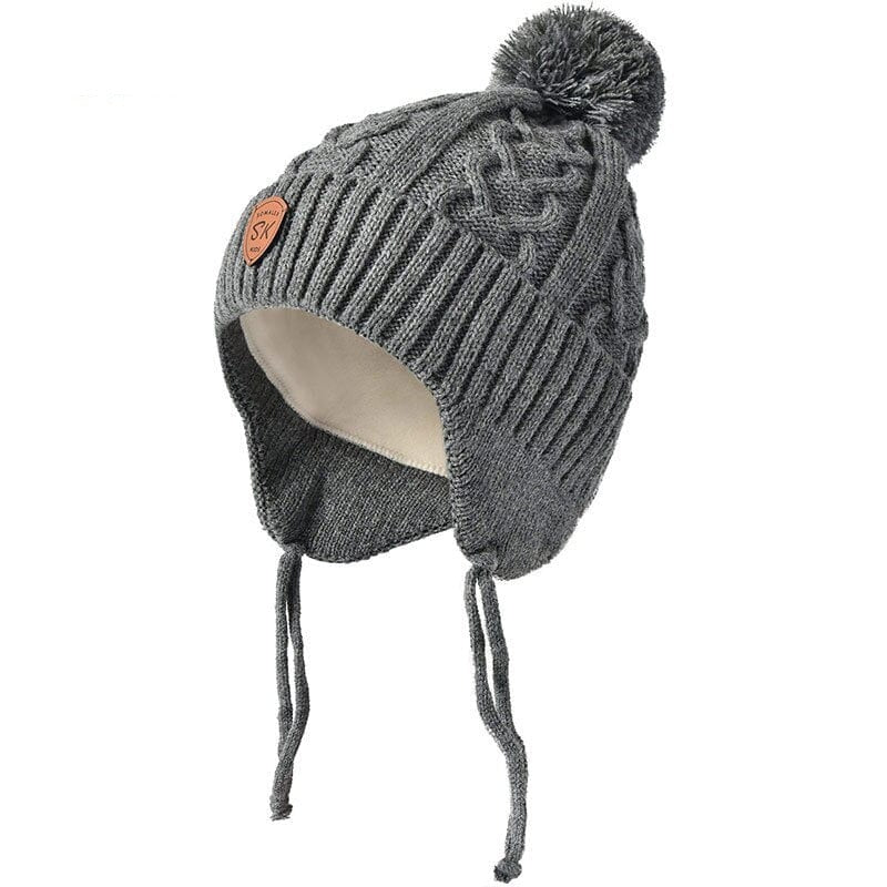 Bonnet enfant tricoté en fourrure véritable