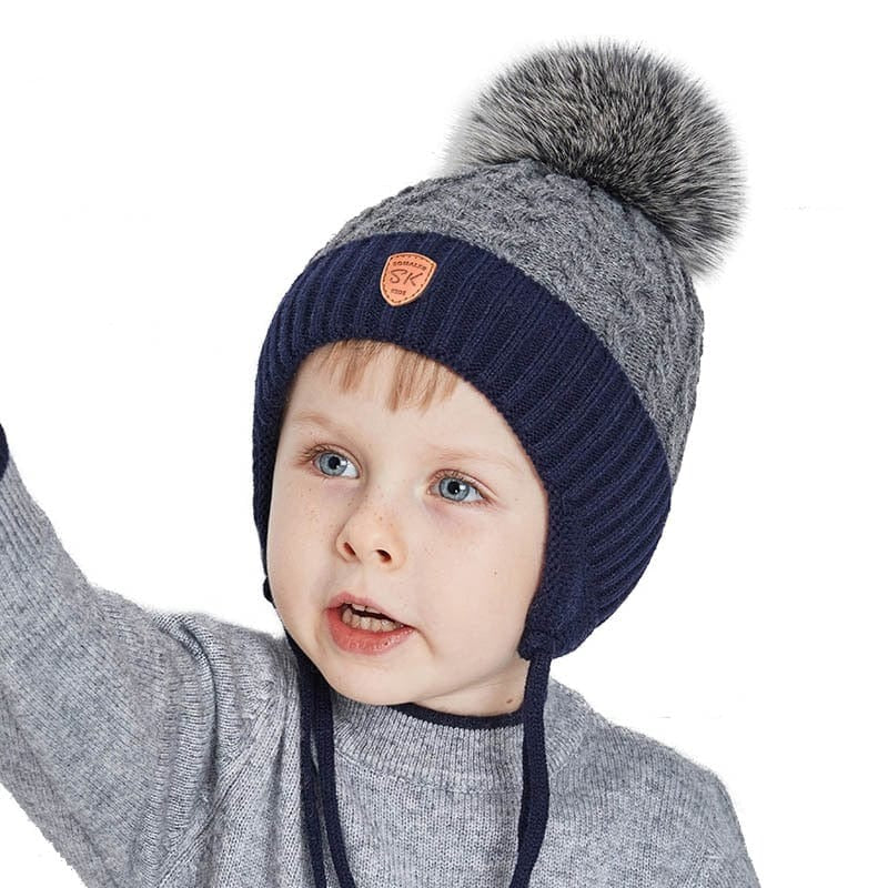 Bonnet enfant tricoté en fourrure véritable