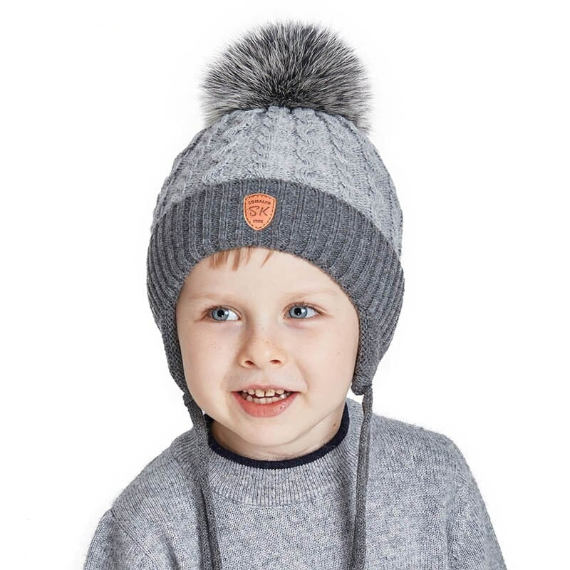 Bonnet enfant tricoté en fourrure véritable